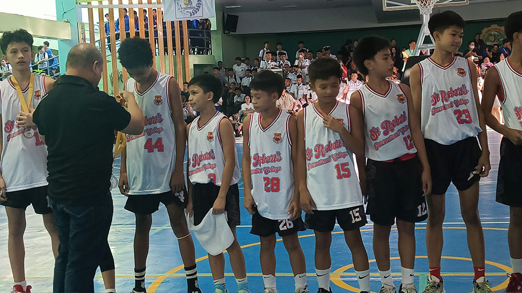Elementary SRIC Basketball Team Triumphs as Champions in ILOPRISAA 2024 — photo 1